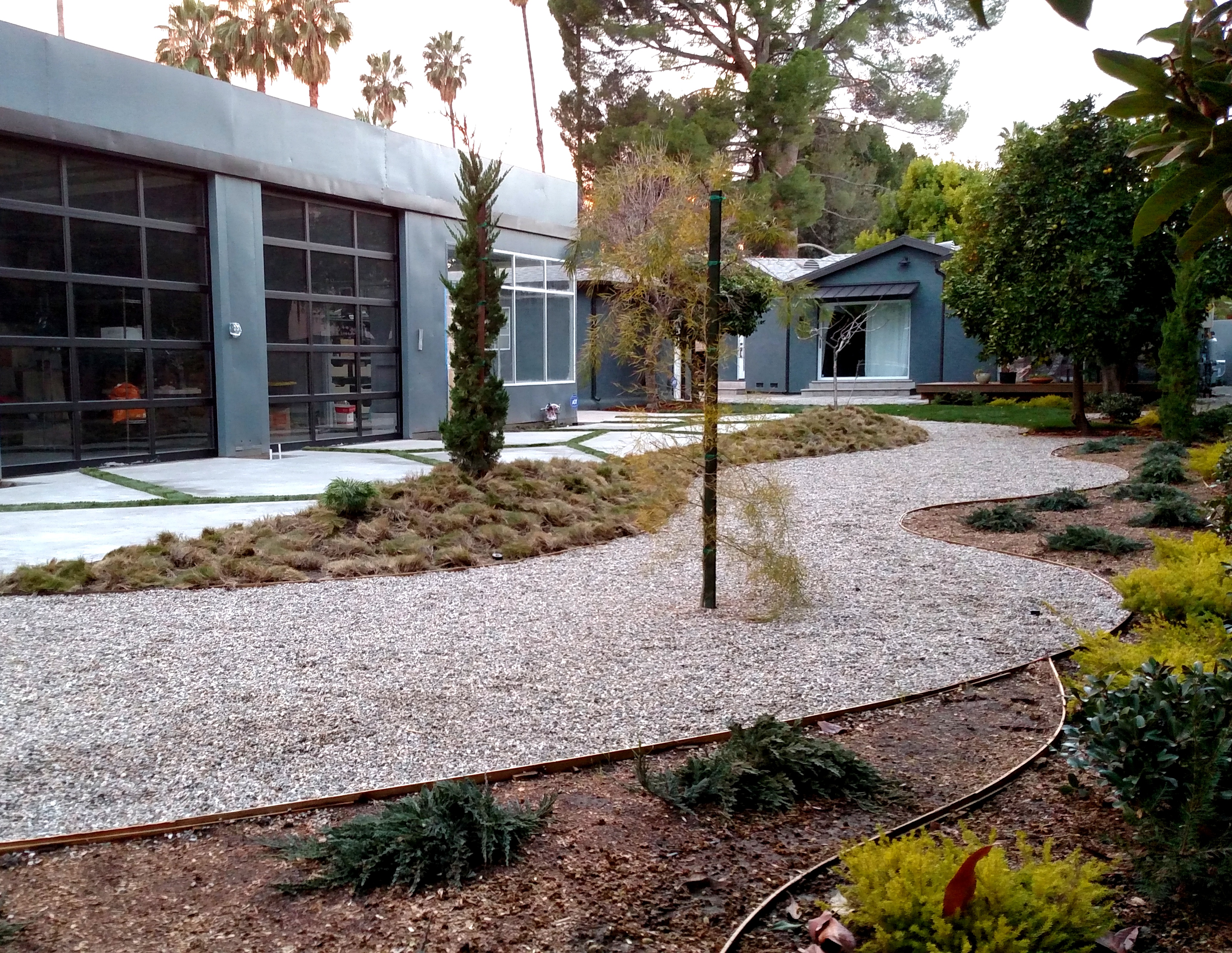 https://atmospherelandscapes.com/wp-content/uploads/2017/02/REAR-YARD-WITH-STUDIO-AND-HOUSE-001.jpg